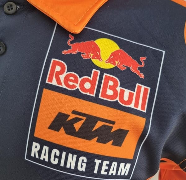 2022 F1 Formula One; KTM Polo Blue Orange - Image 2