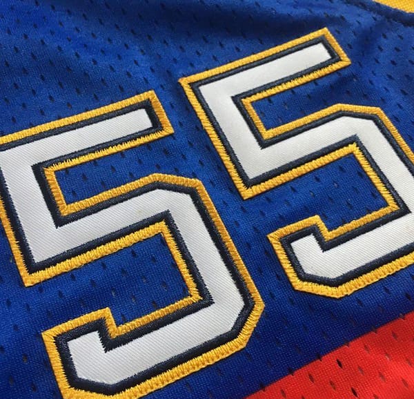 Men's Dikembe Mutombo Blue Retro Classic Team Jersey - Image 10