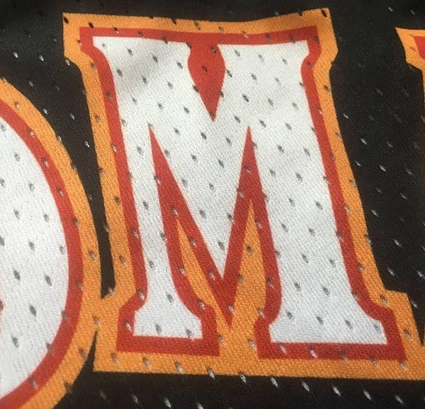 Men's Dikembe Mutombo Black And Red Retro Classic Team Jersey - Image 9