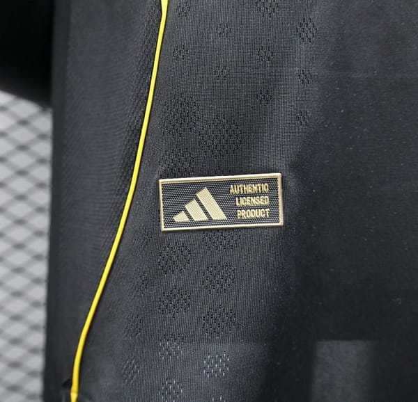 Player Version 25/26 Real Madrid Black with Gold Accents and Emirates Sponsor Jersey - Image 5